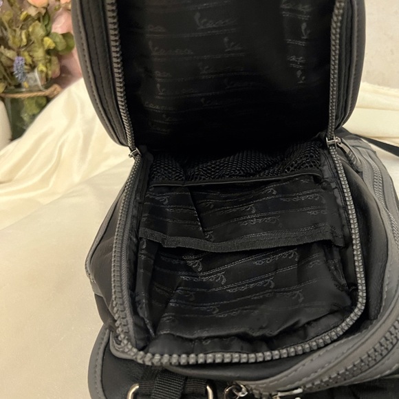 Vespa Black Backpack with multiple pockets, heavy duty zippers. Faux leather - Picture 9 of 14